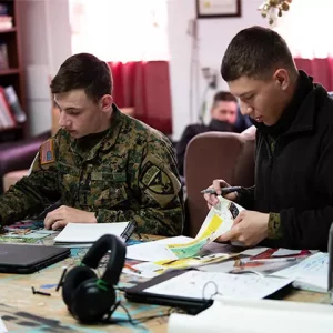 Two teenage boys studying