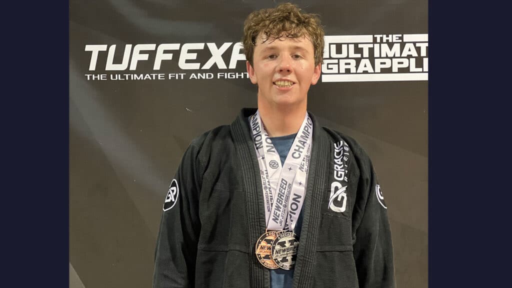 Carl Ashby, FUMA Class of 2021, medals in Raleigh area martial arts tournament.