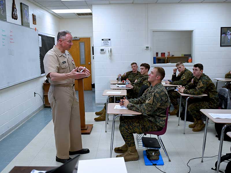 Capt. Mark Black teaching in his classroom.