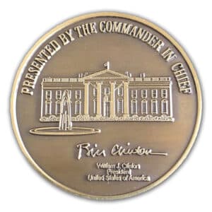 President Bill Clinton was the first US President to adopt the use of the challenge coin in recognizing and honoring individuals for their service.