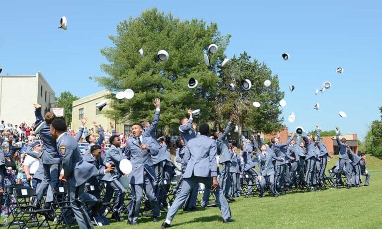 Cadets celebrate receiving their high school diplomas at Fork Union Military Academy's Class of 2023 graduation ceremony in June 2023.