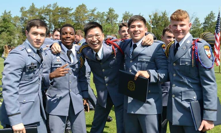 Cadets celebrate receiving their high school diplomas at Fork Union Military Academy's Class of 2023 graduation ceremony in June 2023.